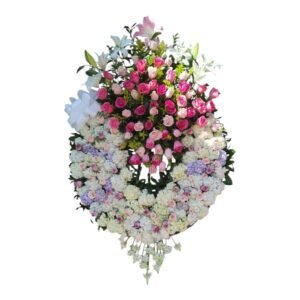 Arreglo fúnebre exclusivo con flores mixtas y hortensias para condolencias en Cali