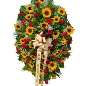 corona funebre de girasoles y rosas rojas con follaje verde lluvia y cinta impresa cali